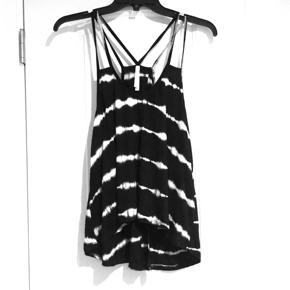 Black and white Strappy tank with split back.